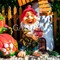 Садовая фигурка гном с клубничкой