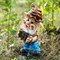 Фигура декоративный Гном садовый с гармонью полистоун F08034 - фото 86609